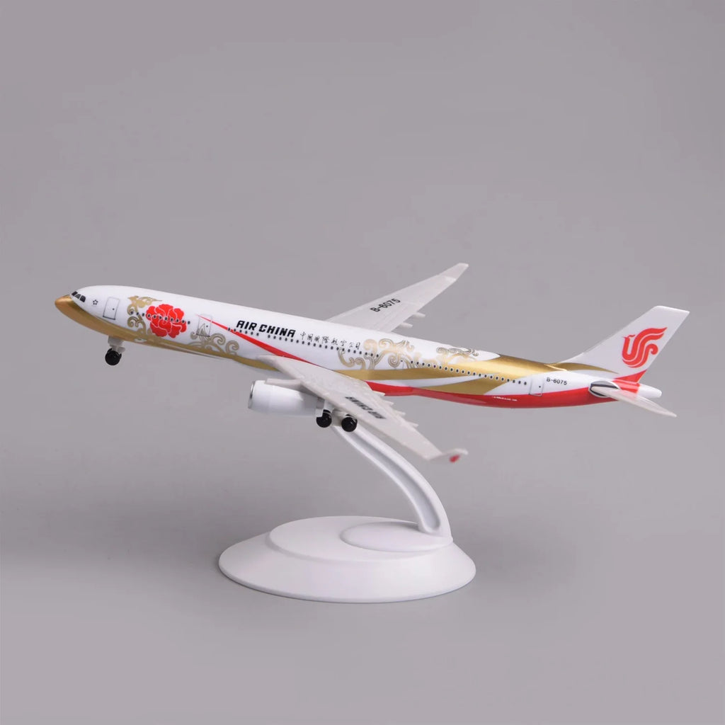 Air China A330 Zijin airliner model on its display stand, side view with red and gold livery