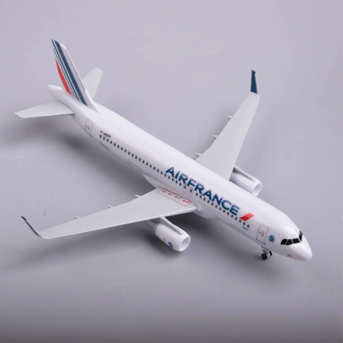 Air France A320 airliner model, high front view showing the wings and engines