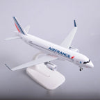 Air France A320 model plane on its display stand, front three-quarter view