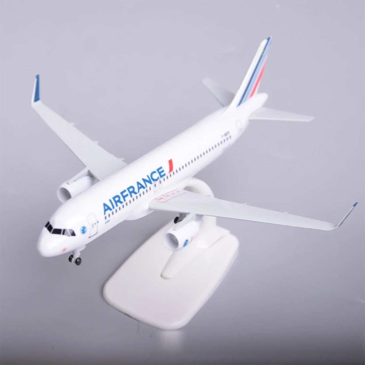 Air France A320 resin model on its display stand, high view showing the wings and tail