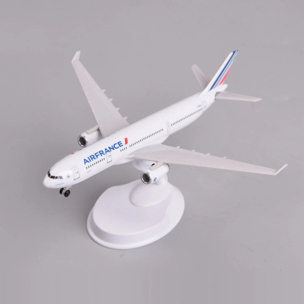 Front three-quarter view of the Air France A330 8-inch model on its display stand