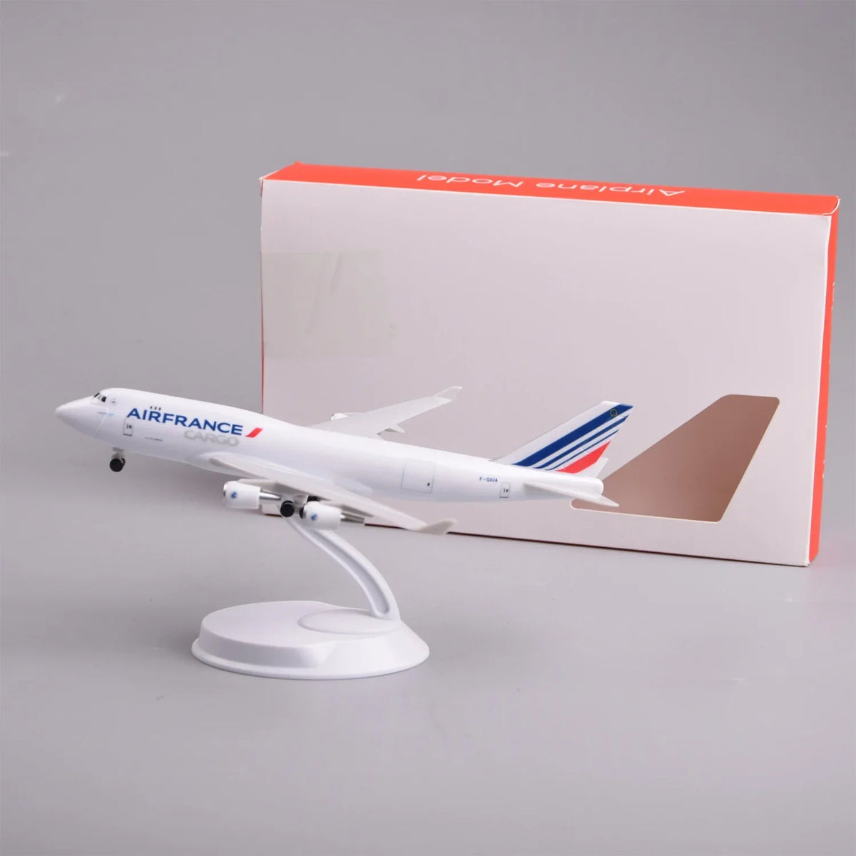 Air France Cargo 747 8-inch model plane on display stand next to its gift box