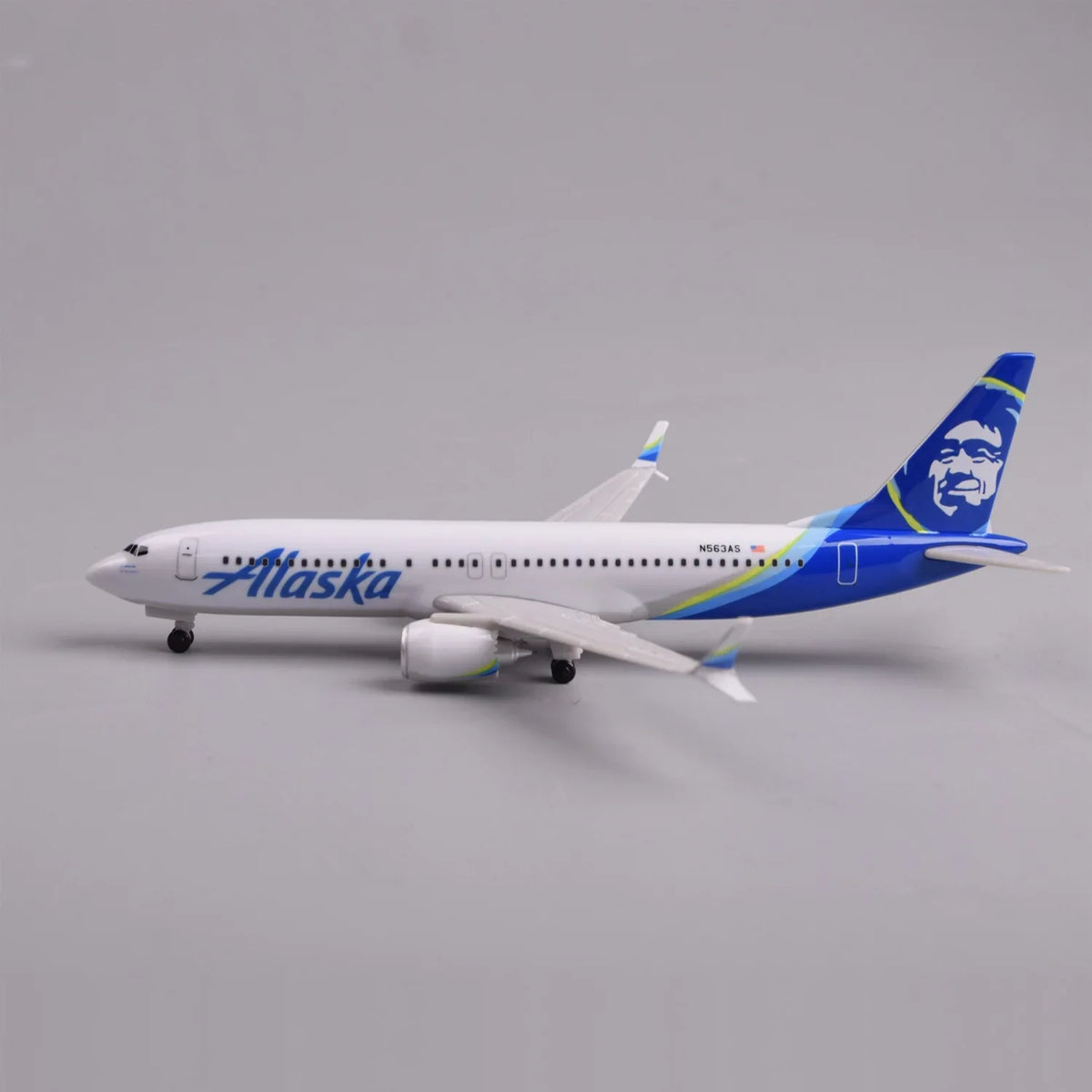 Side profile of the Alaska Airlines 737 MAX 8 model with landing gear down and blue tail