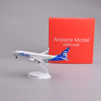 Alaska Airlines 737 MAX 8 8-inch model on its display stand next to its red gift box