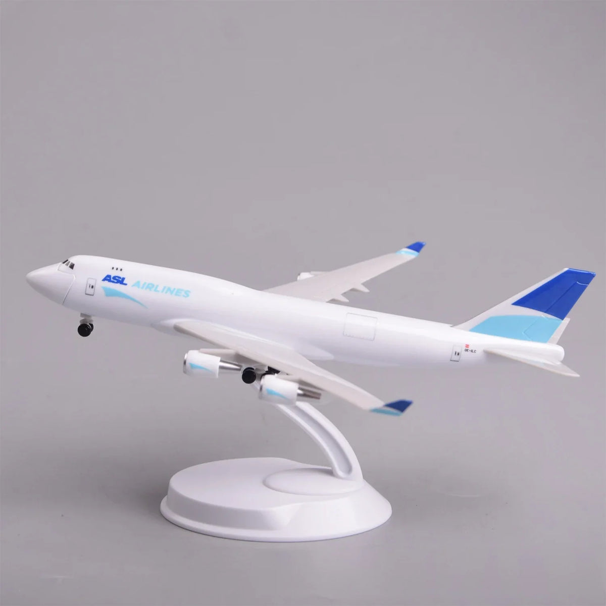 ASL Airlines 747-400 model plane on its display stand, front three-quarter view