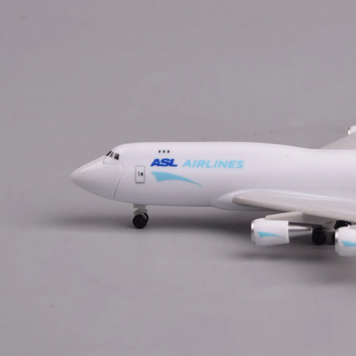 ASL Airlines 747 model on its display stand, front view of the nose and blue livery