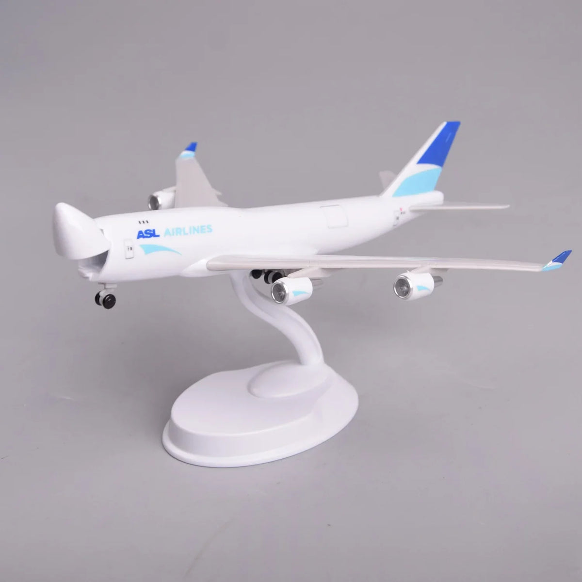 ASL Airlines 747 model plane on a display stand, front three-quarter view