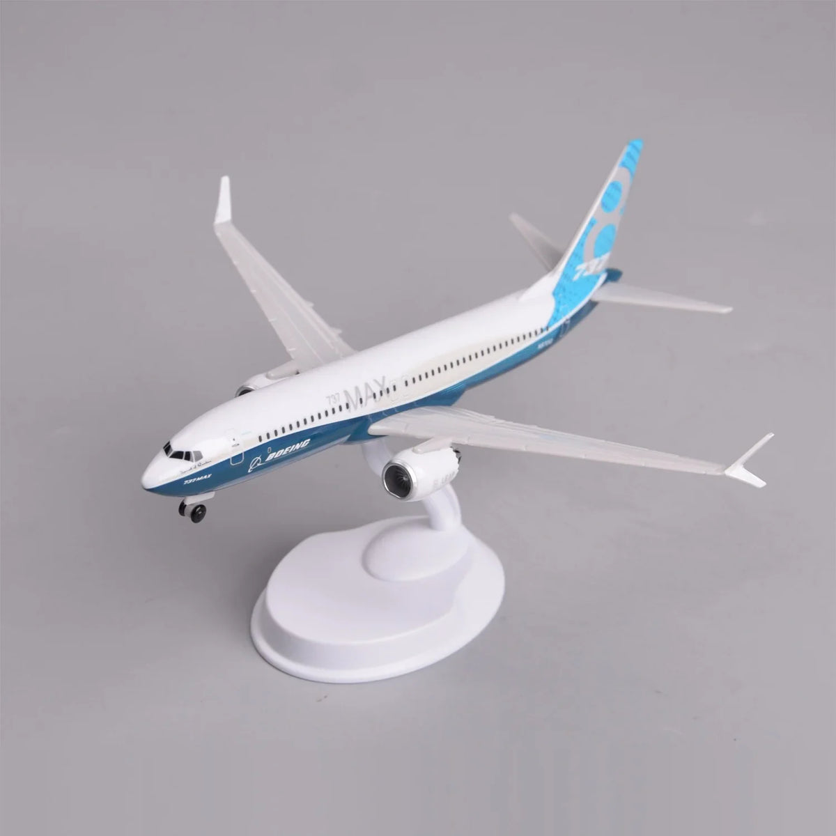 Front three-quarter view of the Boeing 737 MAX 8 prototype model on its display stand