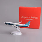 Boeing 737 MAX 8 prototype 8-inch model on its display stand next to its red gift box
