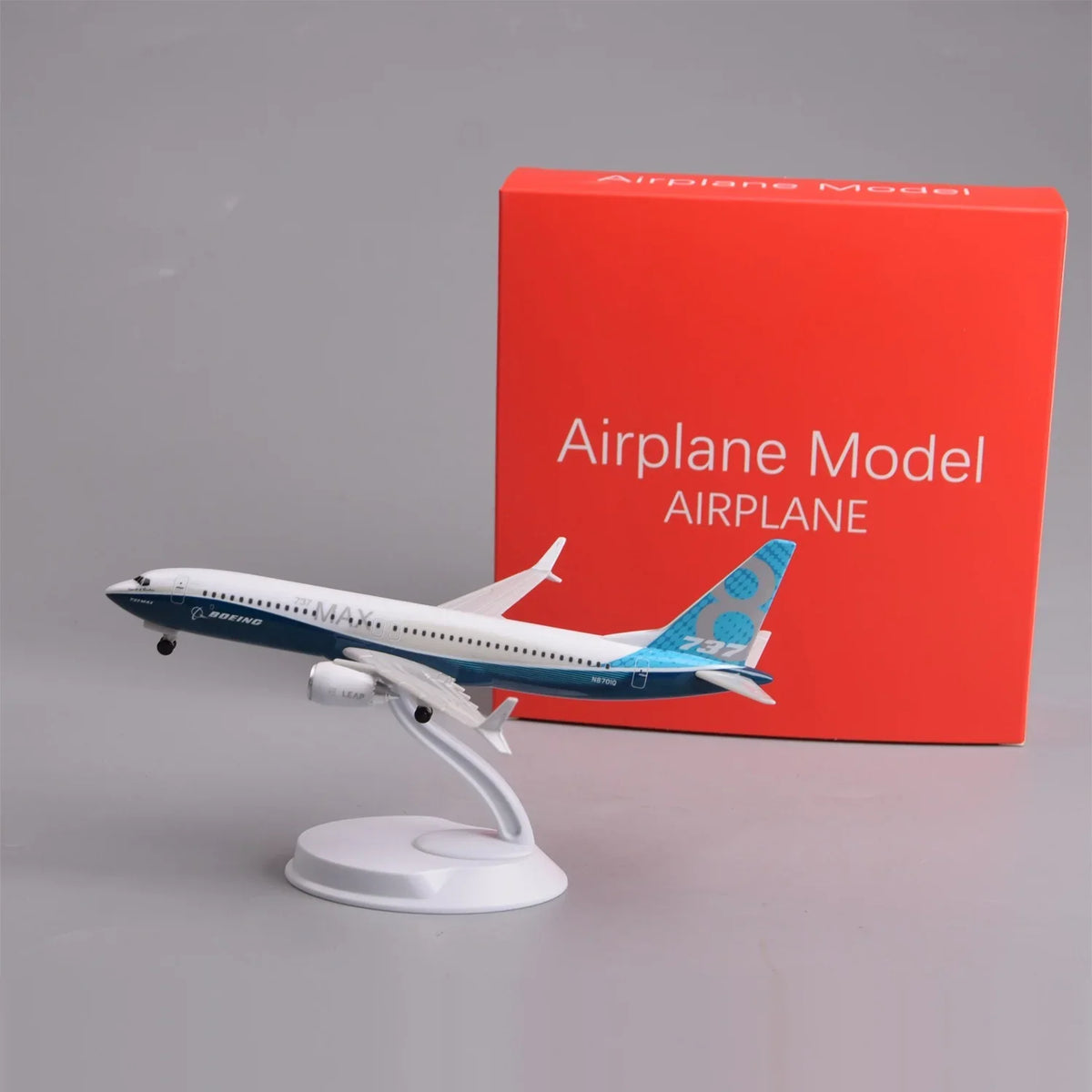 Boeing 737 MAX 8 prototype 8-inch model on its display stand next to its red gift box