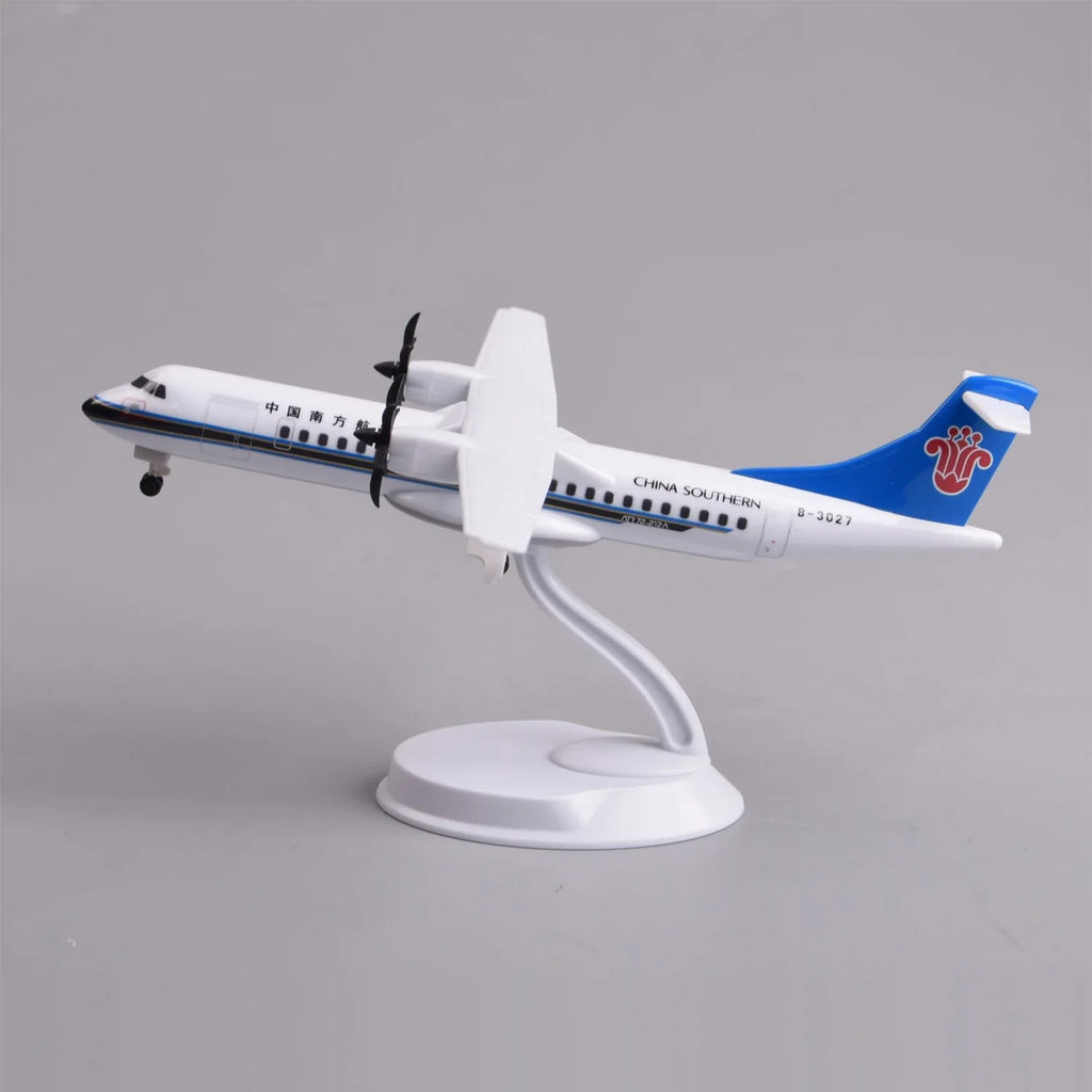 China Southern ATR 72-600 desk model in a climbing pose on its display stand, side view