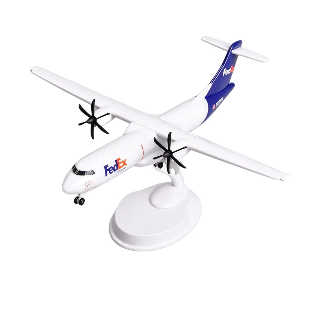 FedEx ATR 72-600 freighter 8-inch resin scale model on its white display stand, on white background