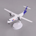 Front three-quarter view of the FedEx ATR 72-600 freighter model on its display stand