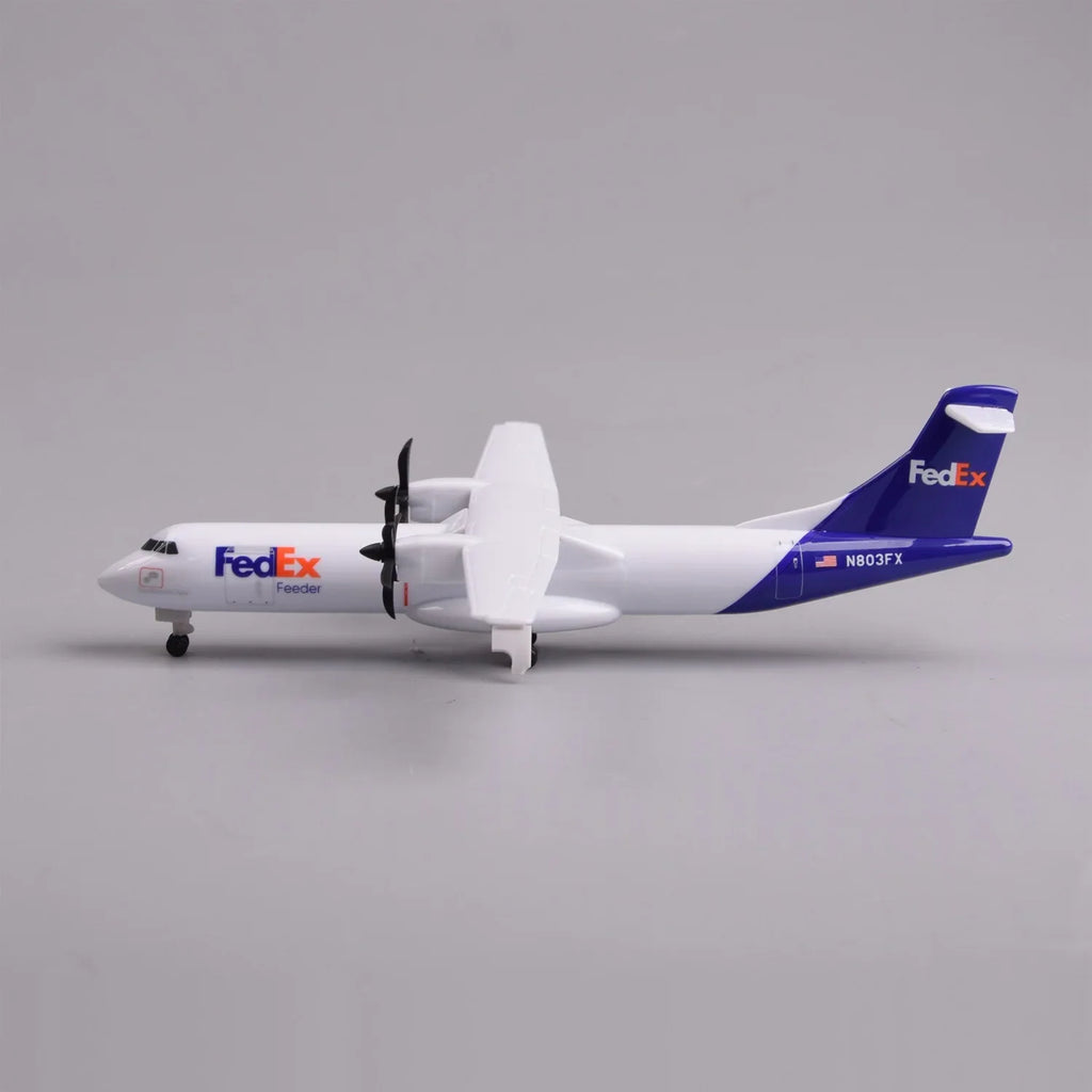 Side profile of the FedEx ATR 72-600 model with landing gear down and purple tail