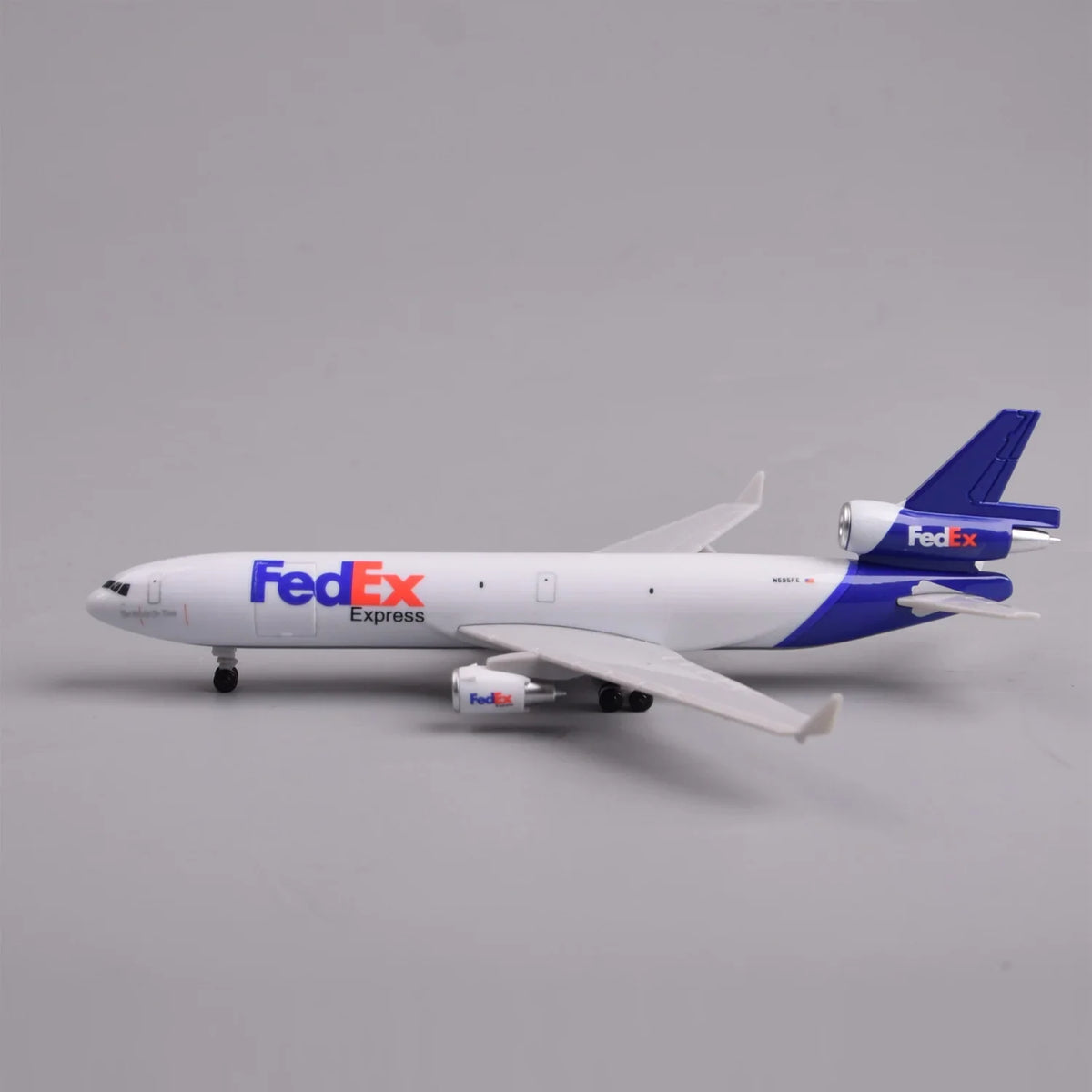 Side profile of the FedEx MD-11 scale model with landing gear and FedEx Express livery