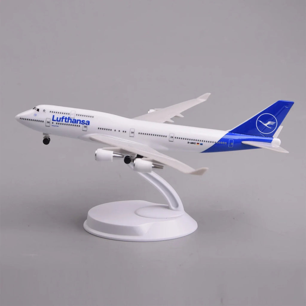 Lufthansa 747-400 model plane on its display stand, side view climbing pose