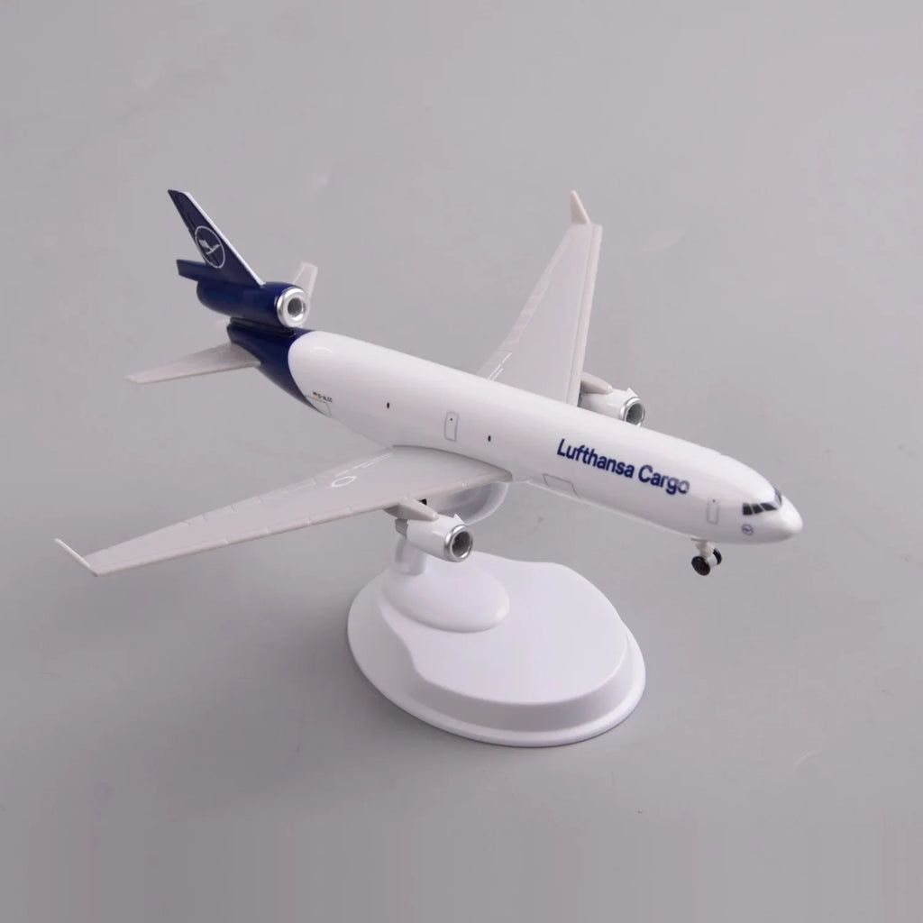 High three-quarter view of the Lufthansa Cargo MD-11 model showing the tri-jet tail