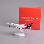 Lufthansa Cargo MD-11 8-inch model on its display stand next to its red gift box