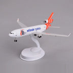Martinair MD-11 cargo jet model with its forward cargo door open, front three-quarter view on display stand
