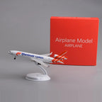 Martinair MD-11 8-inch model on its display stand next to its red gift box
