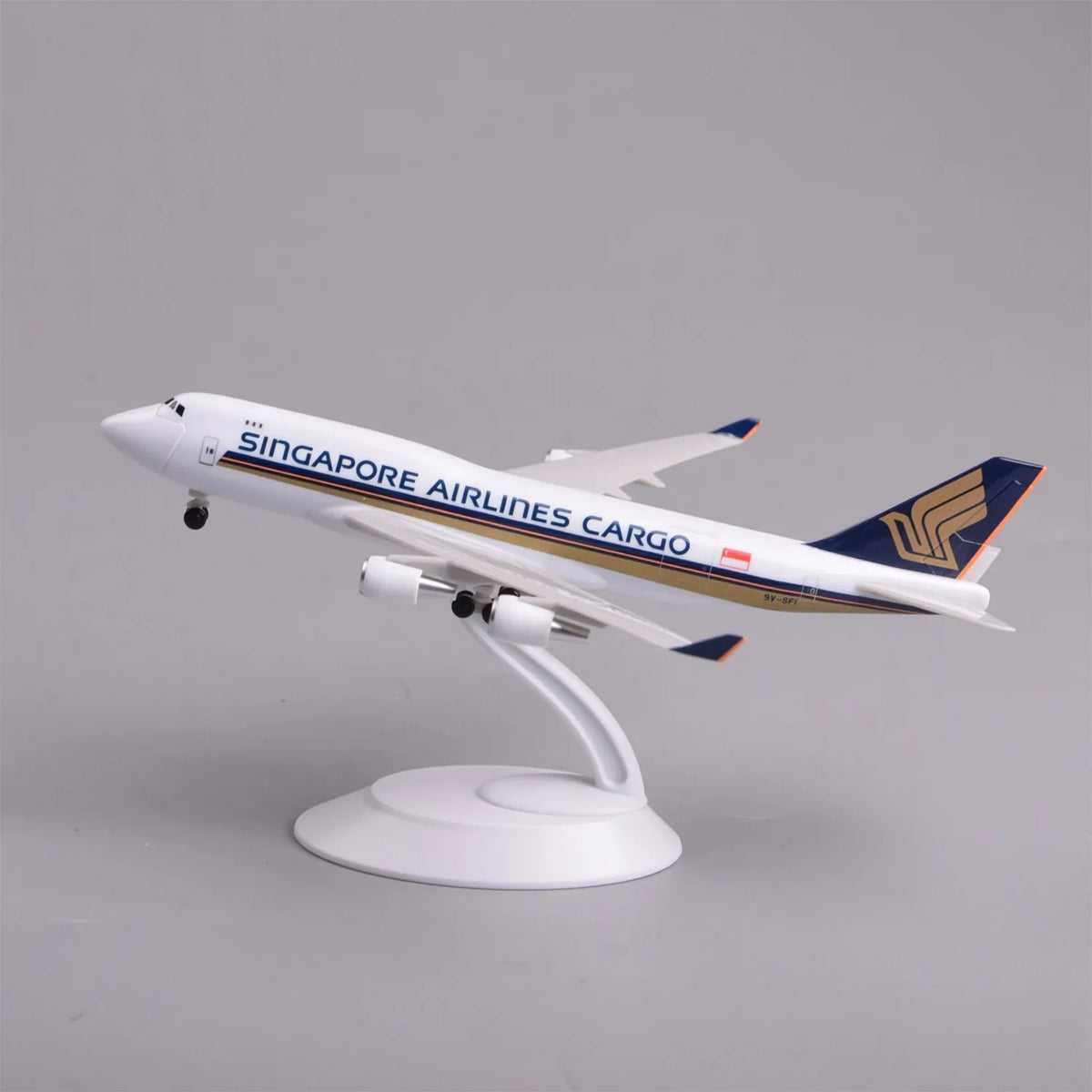 Singapore Airlines Cargo 747-400 model plane on its display stand, front three-quarter view
