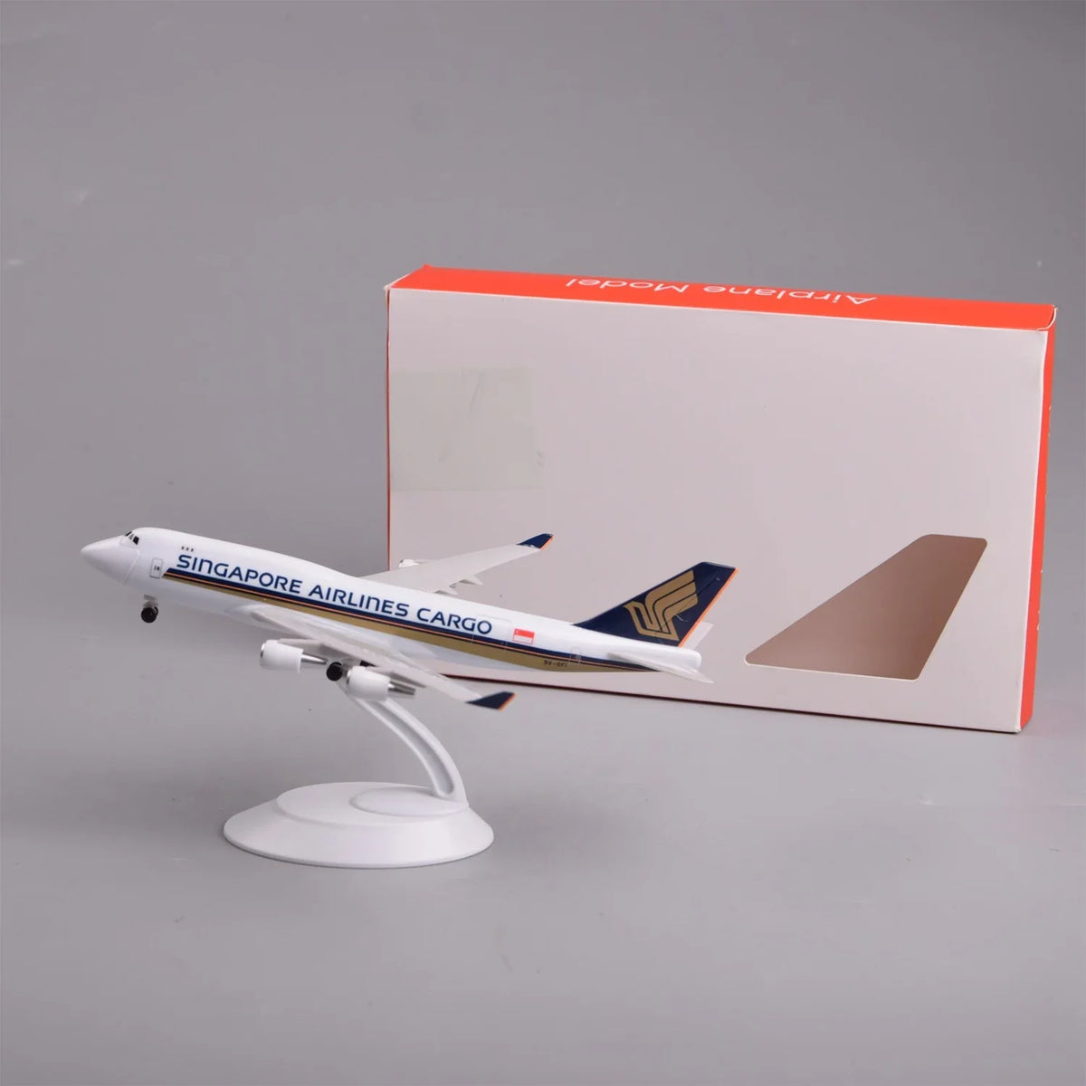 Singapore Airlines Cargo 747 8-inch model plane on display stand next to its gift box