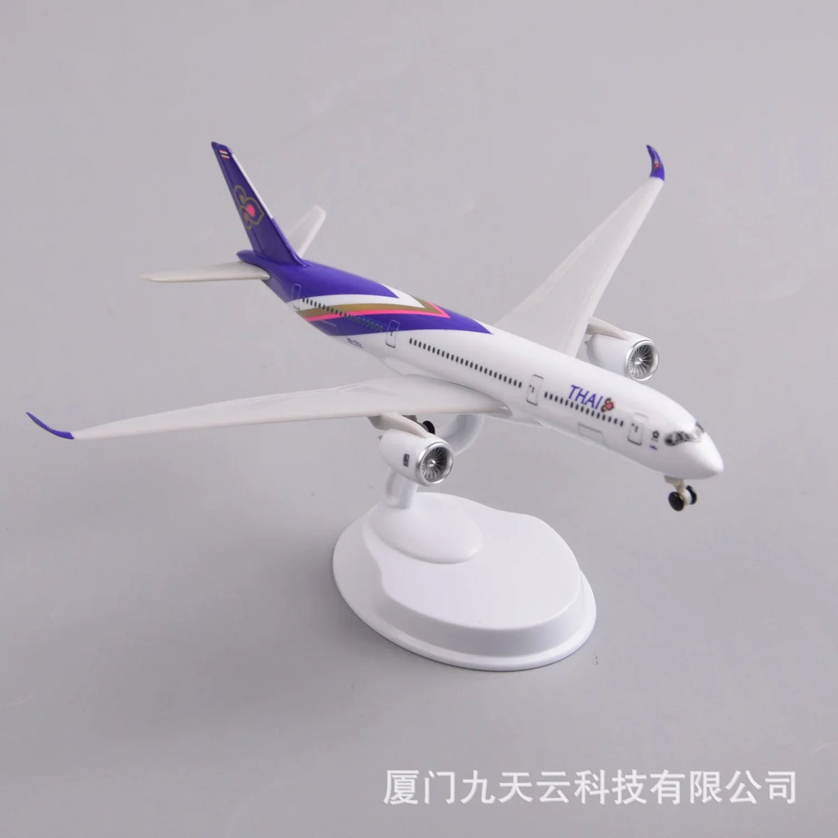 Thai Airways Airbus A350 8-inch resin scale model on its white display stand, high three-quarter view