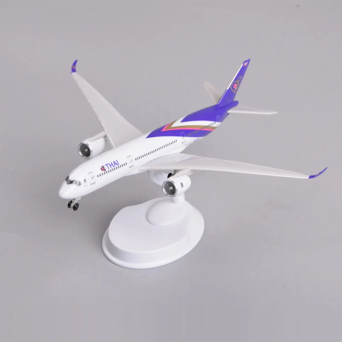 Front three-quarter view of the Thai Airways A350 model showing the upswept wingtips
