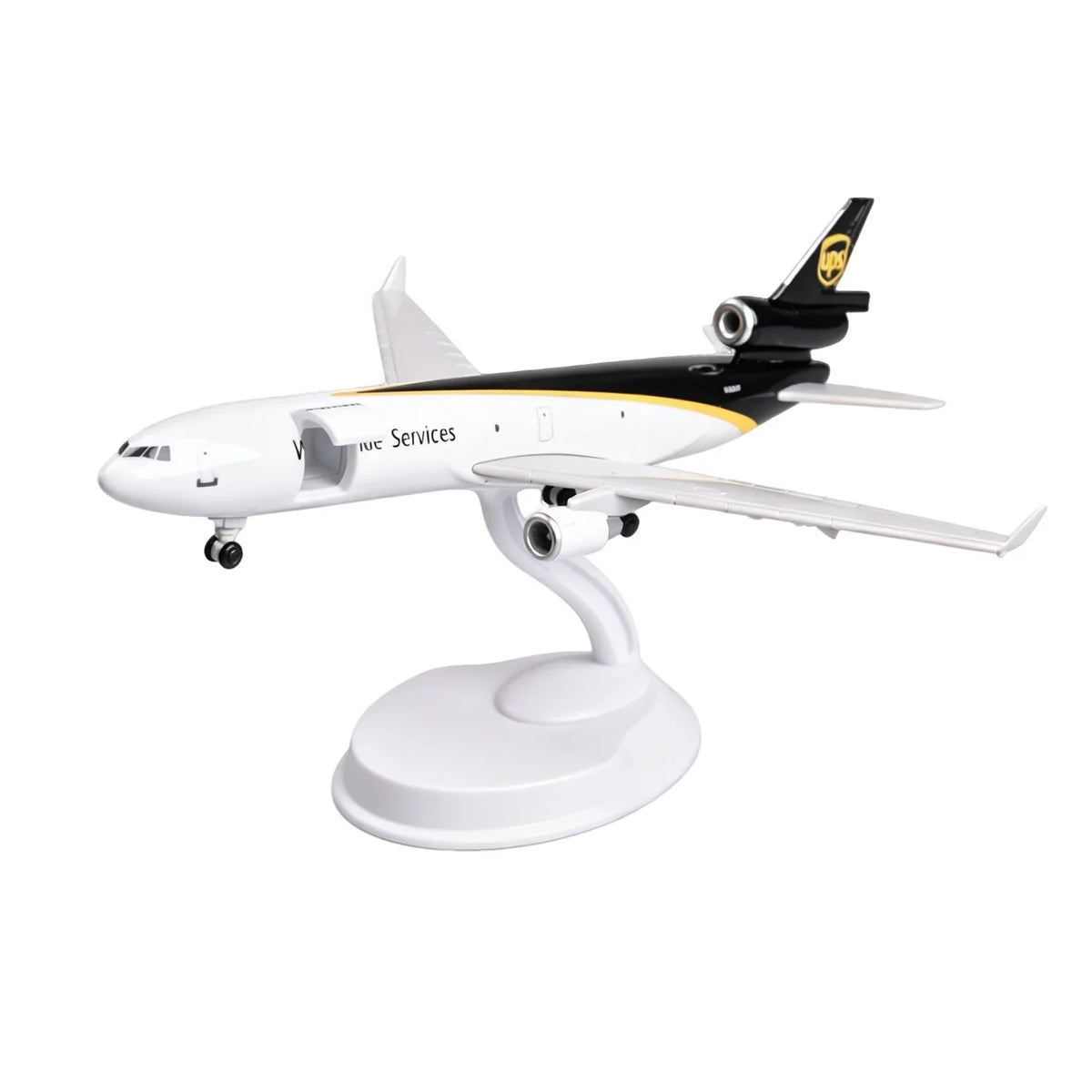 UPS MD-11 cargo jet scale model, 8-inch resin freighter on white display stand, front three-quarter view on white background