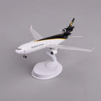 UPS MD-11 cargo jet model on its display stand, front three-quarter view