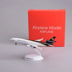 UPS MD-11 8-inch model plane on display stand next to its red gift box